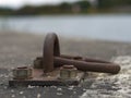 An old rusty mooring ring Royalty Free Stock Photo